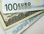 Курс евро к доллару опустился по результатам среды до 1,29